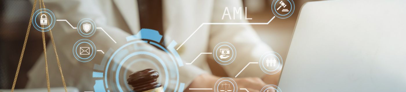 Judge in a courtroom using laptop and tablet