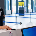 Senior woman checking in at an airport