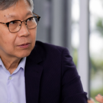 client and lawyer discussing legal documents