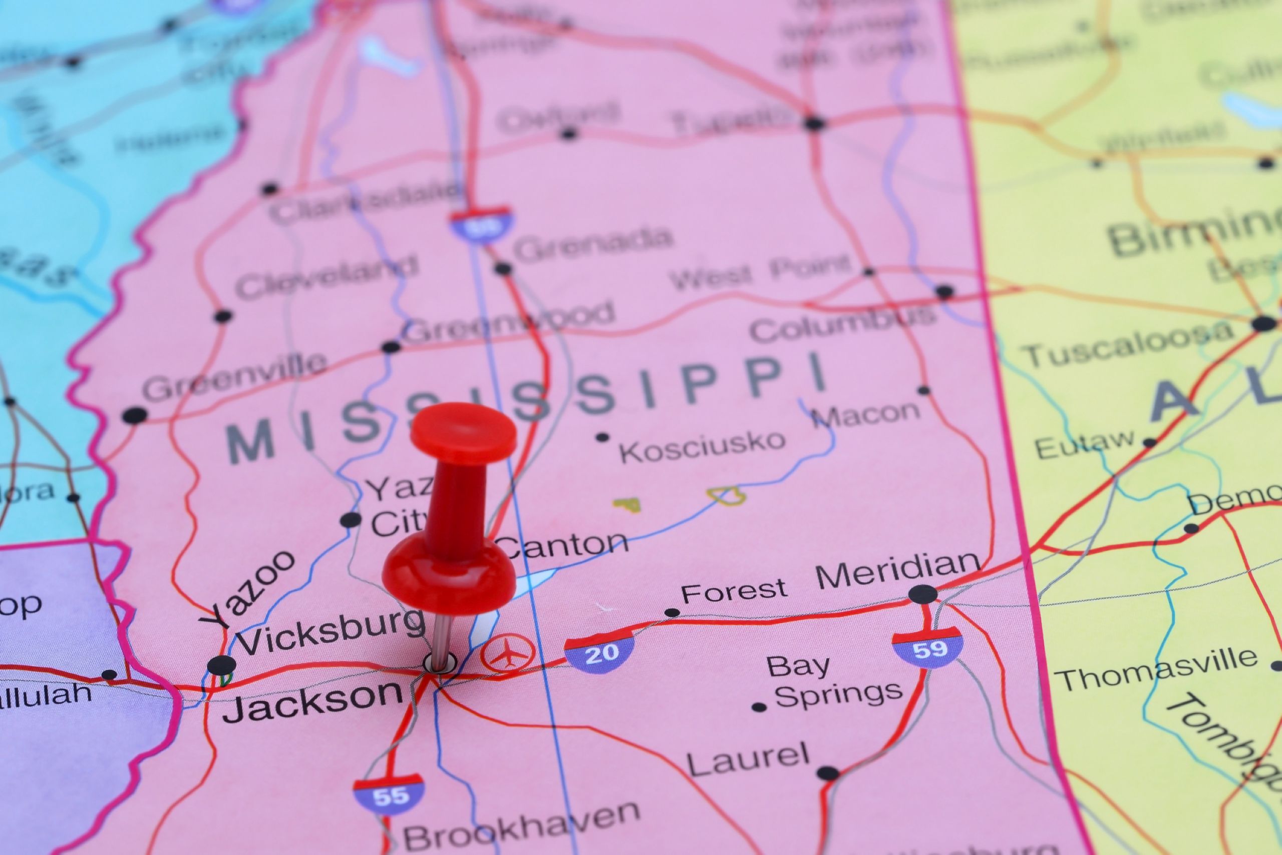 Photo of pinned Jackson, Mississippi on a map of USA
